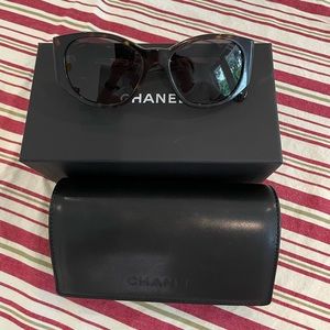 Original Chanel sunglasses, brown oval shape, never worn, perfect condition.